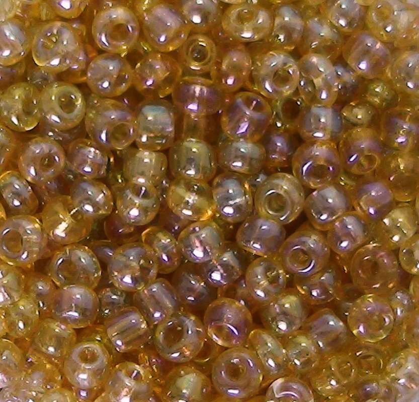 Rocailles 2,6mm transparent gelüstert gold